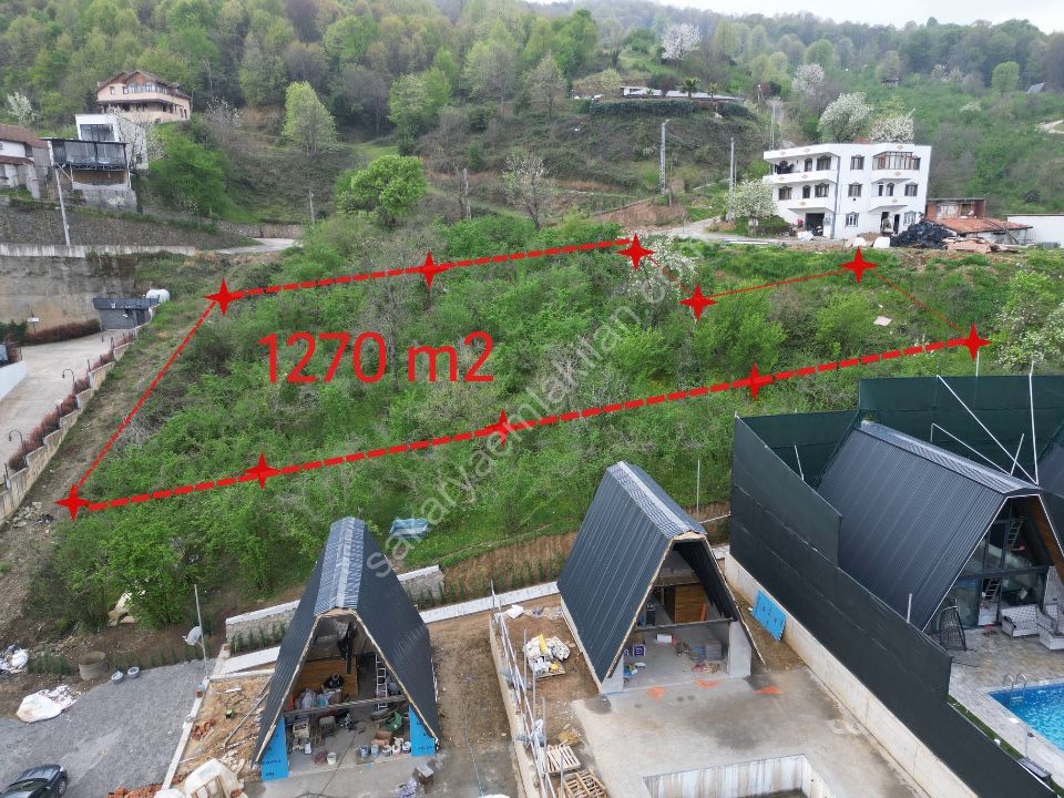 SAPANCA GÜLDİBİ'NDE GÖL MANZARALI 1.270 m² İMARLI ARSA